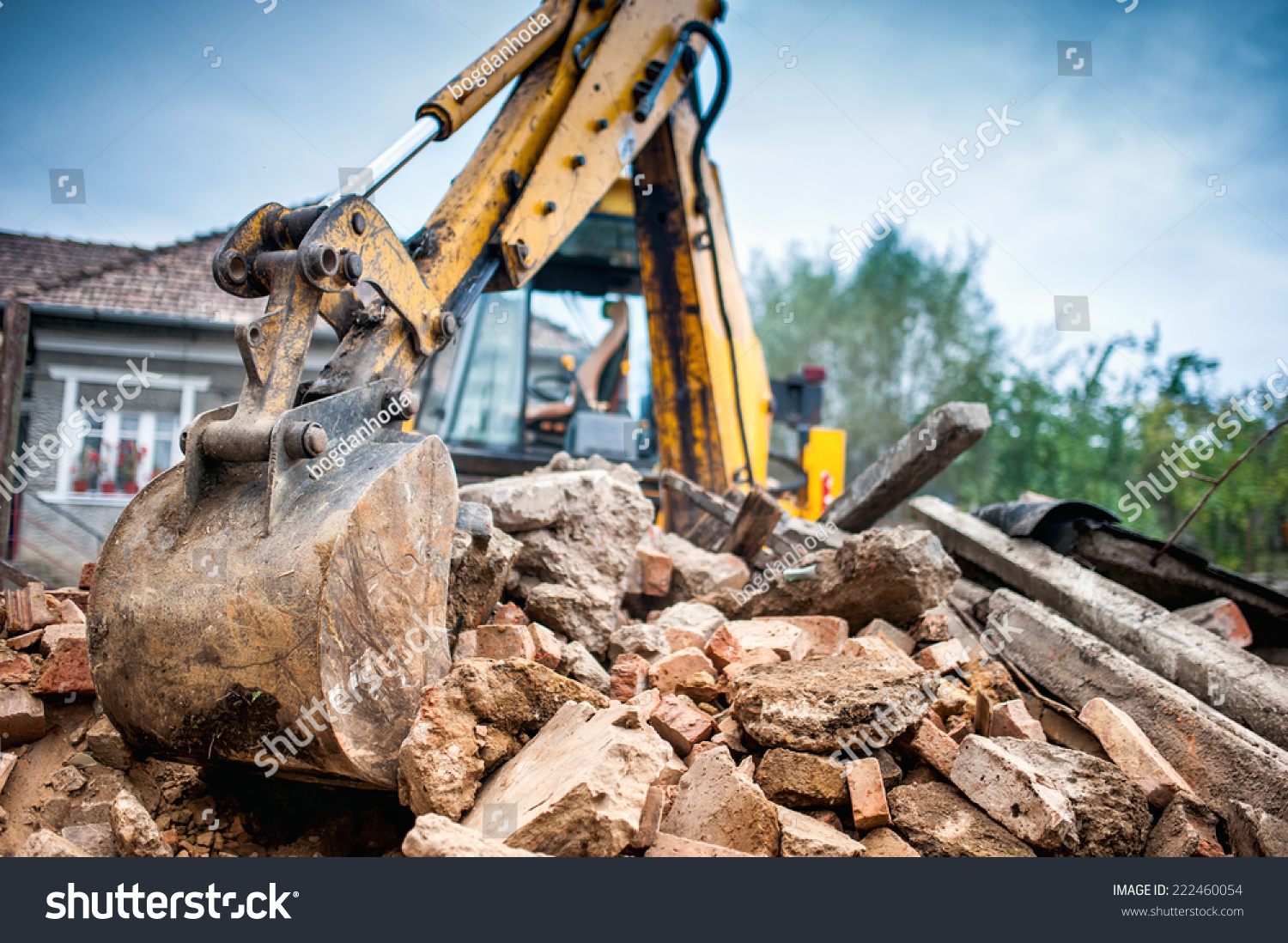 stock photo hydraulic crusher excavator backoe machinery working on site demolition 222460054